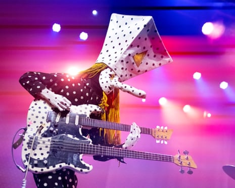 Musician wearing strange mask